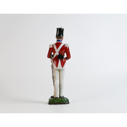 1490 - A Sitzendorf porcelain figure of Royal Artillery 1830, marked 1562 to base, height 27.5cm - tip of s... 