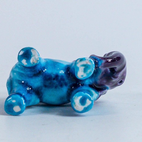 1561 - Bernard Moore baby elephant, in a rare purple and turquoise colour glaze, height 4cm