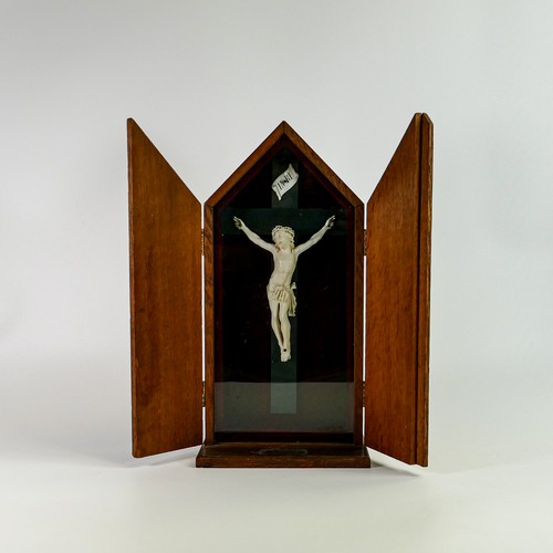 1581 - Oak cased early 20th century hand carved Crucifix, with dedication plaque dated 1919, height 41cm