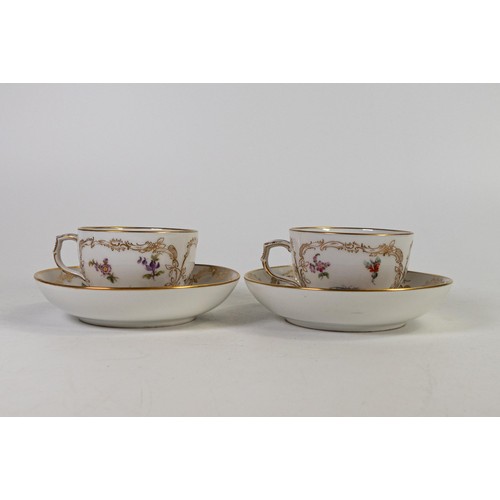 1596 - Pair of Berlin KPM cups and saucers, decorated with flowers and insects. (4)