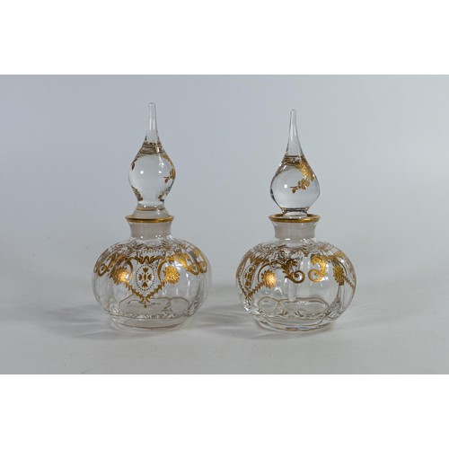 1709 - De Lamerie boxed gilded crystal perfume/scent bottles, height of each 15cm (2)