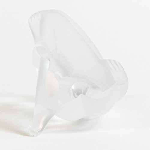 1743 - A Lalique frosted glass kneeling nude figure, etched Lalique, France to base, height 10cm. Boxed