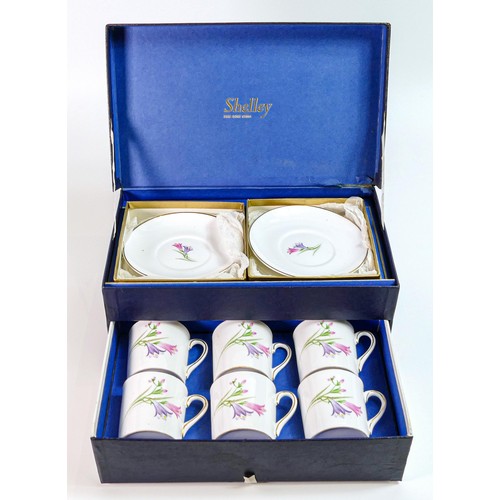 1826 - Boxed Shelley coffee cans and saucers, pattern 857 in original box.