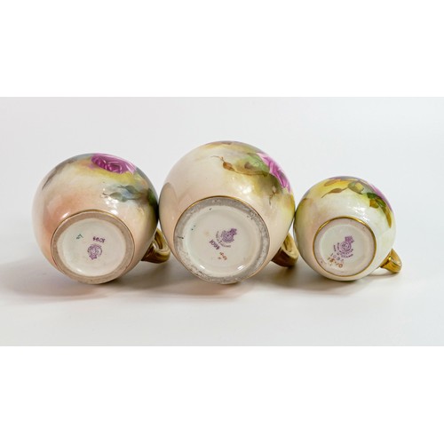 1874 - A graduated set of Royal Worcester gilded ewers, painted with roses, the larger one signed Austin an... 