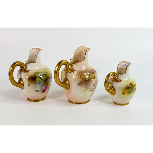 1874 - A graduated set of Royal Worcester gilded ewers, painted with roses, the larger one signed Austin an... 