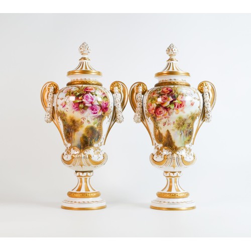 1937 - Royal Worcester pair of gilded two handled vase & covers decorated with garden & roses by F Roberts,... 