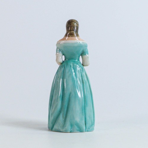 1943 - An early coloured Royal Worcester candle snuffer depicted as Jenny Lind, height 10cm, unmarked