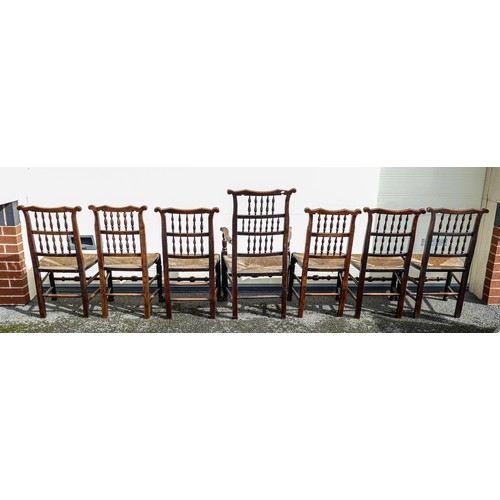 2039 - Seven 19th century rush seated Ash dining chairs including one carver (7)