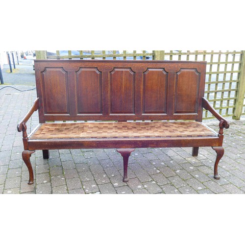 2046 - Early 19th century Oak five panel Settle on Queen Anne supports, length 182cm, height 110cm & depth ... 