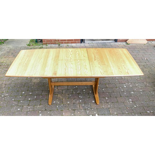 2101 - Late 20th century Light coloured Ercol Windsor medium dining table (extendable) 1193 plus specially ... 