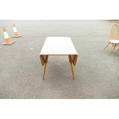 2113 - Late 20th century Light coloured Ercol drop leaf dining table, open length 128cm, depth 112cm & heig... 