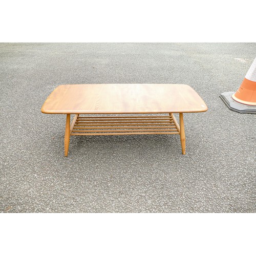 2115 - Late 20th century Light coloured Ercol coffee table (unmarked), length 105cm, depth 46cm & height 36... 