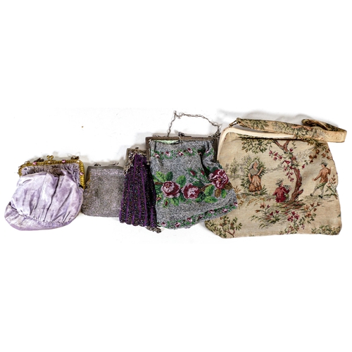 2210 - A mixed collection of items to include - early 20th century beaded purses, fur stole , smoking hats,... 