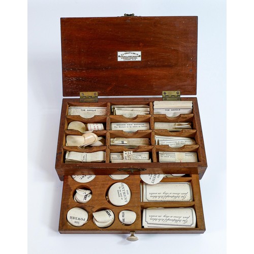 2244 - C J Hewlett & Son Limited wooden Apothecary case containing paper bottle labels together with 8 simi... 