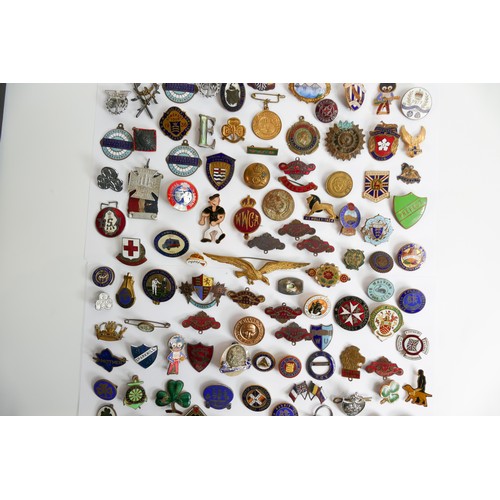 2267 - A collection of early 20th century & later enamel pin badges & similar with varying themes