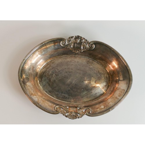 2273 - A White Star Line silver plated cake dish of oval form with reeded borders and pierced cartouches be... 