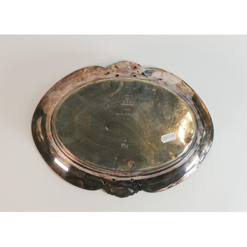 2273 - A White Star Line silver plated cake dish of oval form with reeded borders and pierced cartouches be... 