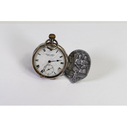 2817 - Silver keyless pocket watch from Robert Milne, Manchester, together with Nazi 1935 pre WWII badge