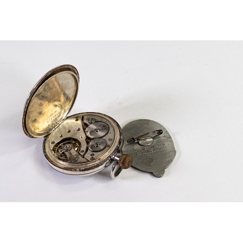 2817 - Silver keyless pocket watch from Robert Milne, Manchester, together with Nazi 1935 pre WWII badge