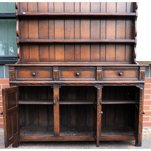 2072 - Titchmarsh and Goodwin oak dresser and plate rack. Height 175cm, length 138cm, depth 47cm