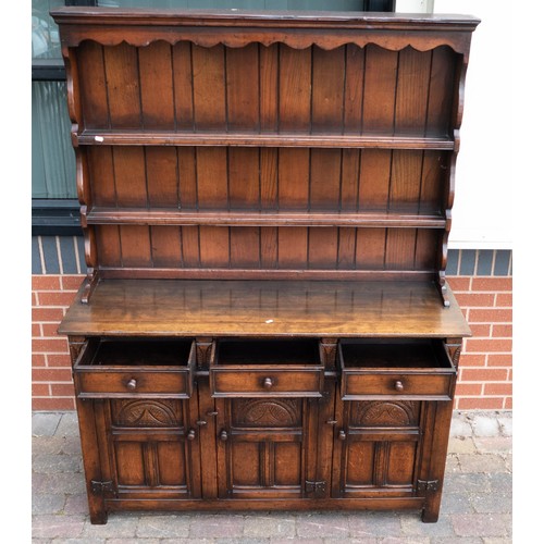 2072 - Titchmarsh and Goodwin oak dresser and plate rack. Height 175cm, length 138cm, depth 47cm