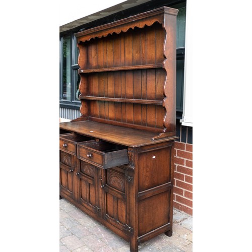 2072 - Titchmarsh and Goodwin oak dresser and plate rack. Height 175cm, length 138cm, depth 47cm