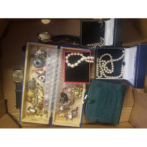 8 - A collection of costume jewellery to include watches, enamelled badges, pearl necklaces, earrings et... 