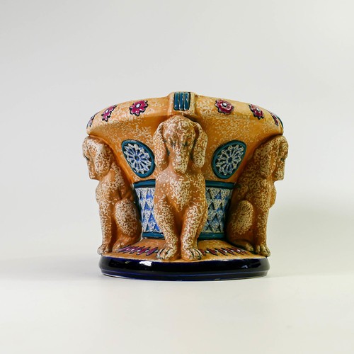 1506 - Amphora Pottery planter decorated with four decorative dog Caryatids.