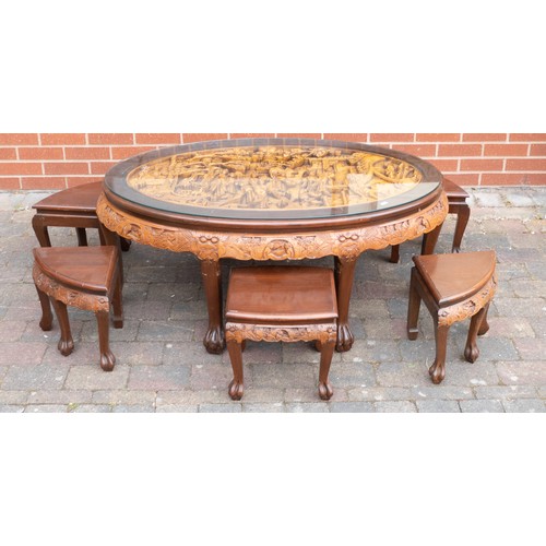 2081 - South Asian carved hardwood oval glass topped coffee table with six matching stools. Length 119cm, w... 