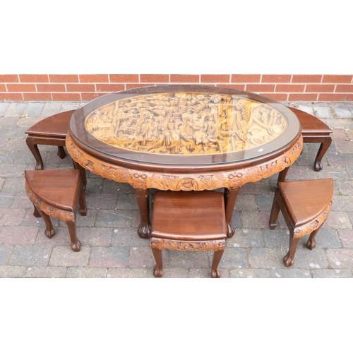 2081 - South Asian carved hardwood oval glass topped coffee table with six matching stools. Length 119cm, w... 