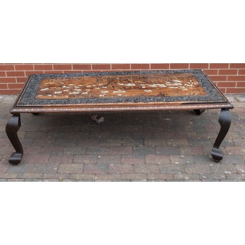 2082 - Large Indian carved coffee table, inlaid with elephants in their natural habitat. Later adapted to a... 