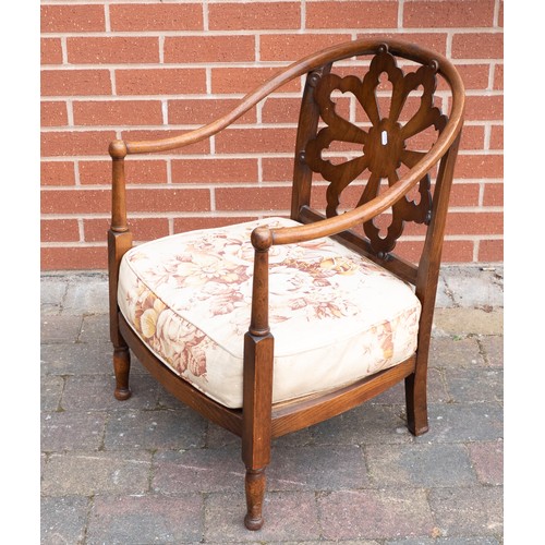 2083 - Early 20th century oak arm chair with upholstered cushion seat.