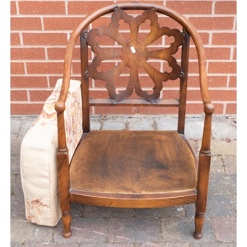 2083 - Early 20th century oak arm chair with upholstered cushion seat.