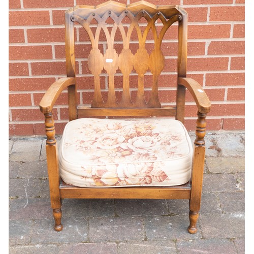 2084 - Early 20th century oak arm chair with upholstered cushion seat.