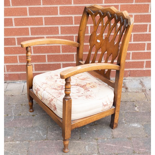 2084 - Early 20th century oak arm chair with upholstered cushion seat.