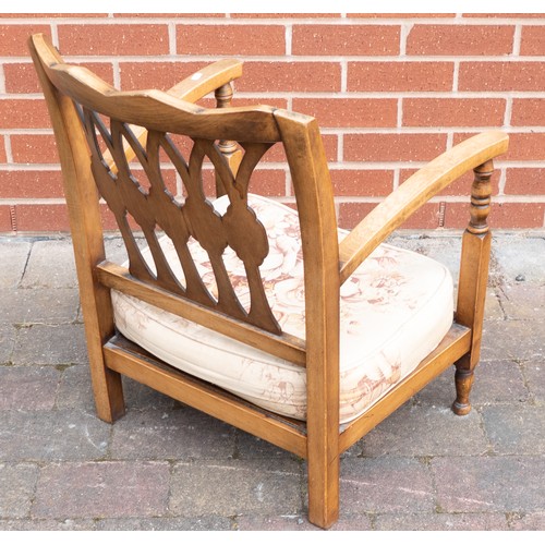 2084 - Early 20th century oak arm chair with upholstered cushion seat.