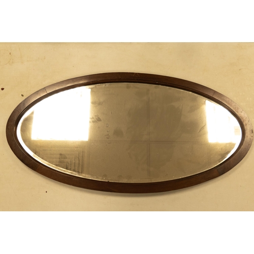 18 - Oak Framed Oval Wall Mirror , diameter at largest 95cm