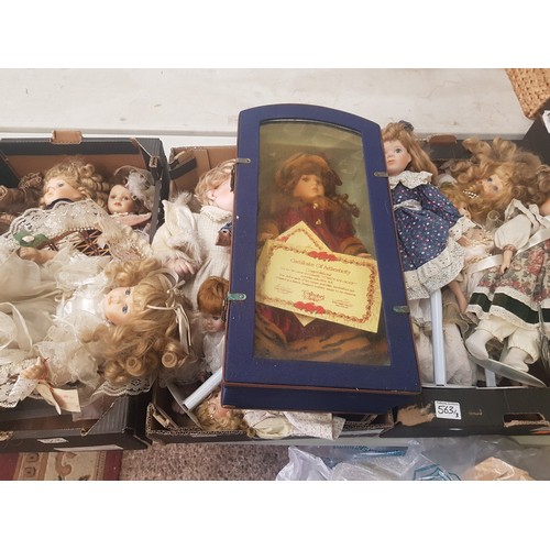 563 - A large collection of vintage childrens dolls (3 trays)