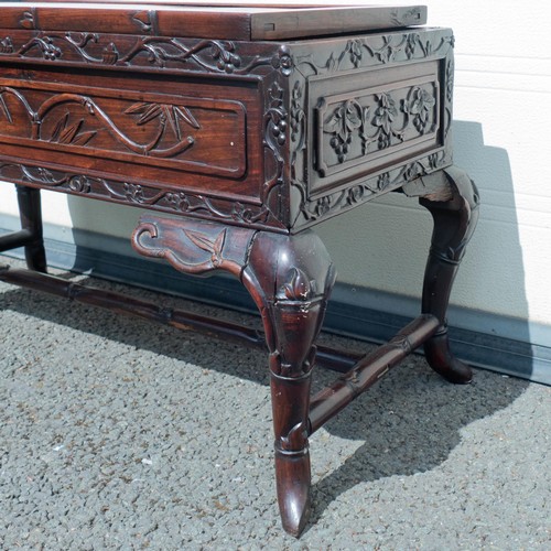 2093 - Finely carved Japanese Meiji period table, losses to carved table edge.