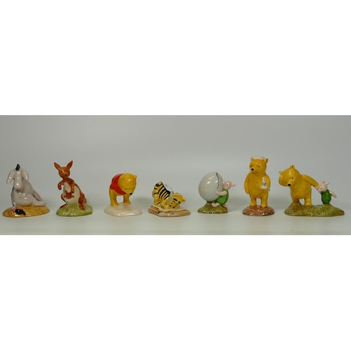 262 - Boxed Royal Doulton Winnie The Pooh figures Pooh lighting the Candle Wp11, Eeyore Tail Wp7, Tigger s... 