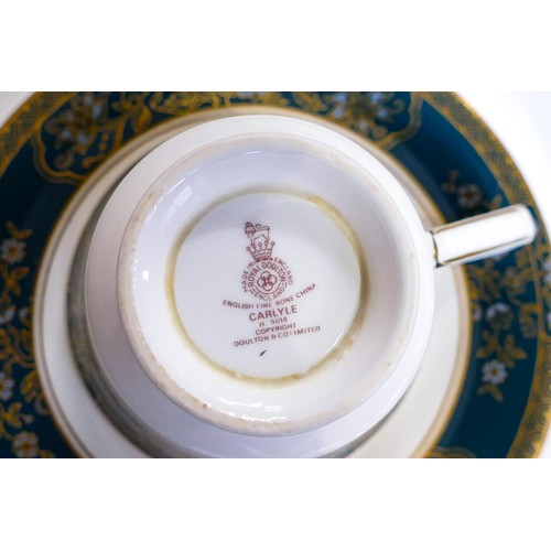 64 - A collection of Royal Doulton Carlisle pattern tea & dinnerware to include - coffee cans & saucers, ... 