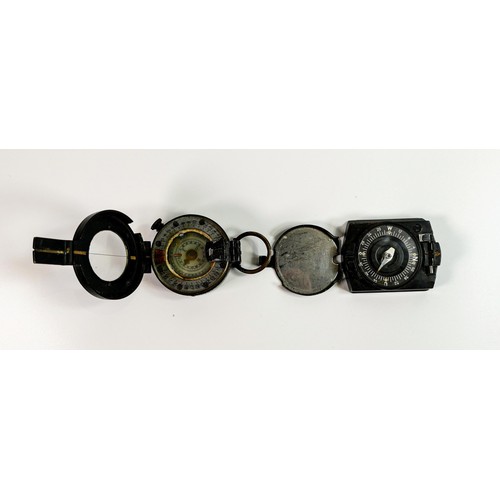 108 - 1941 MKIII British Prismatic Marching Compass, similar damaged item together with two related canvas... 