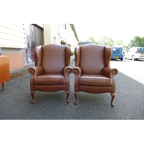 611 - Two Leather Wingback Armchairs on Queen Anne legs