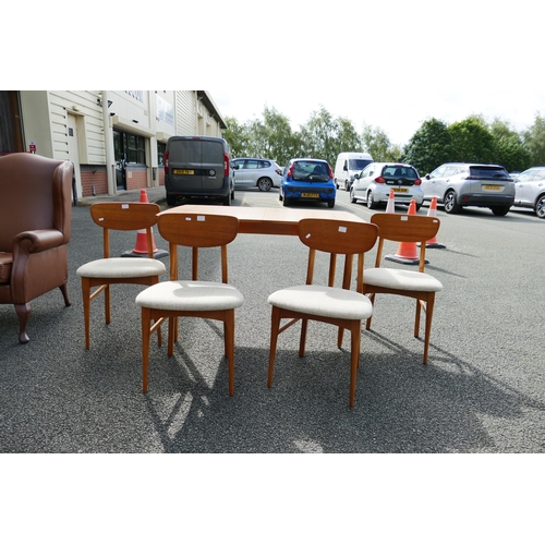 615 - Mid Century extending dining table together with four chairs