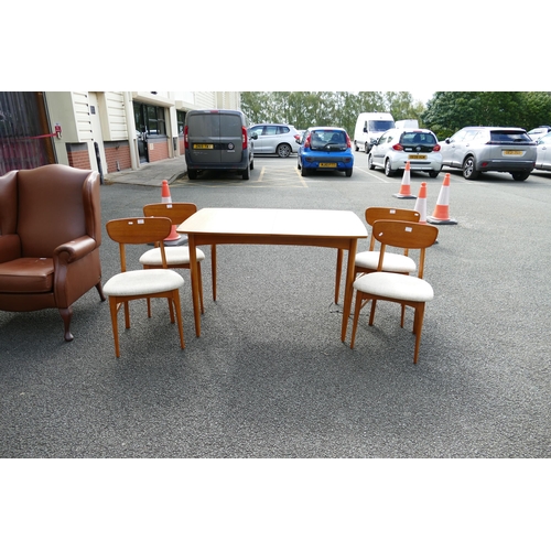 615 - Mid Century extending dining table together with four chairs