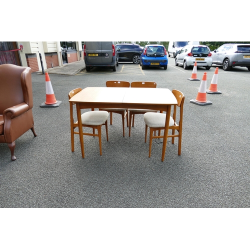 615 - Mid Century extending dining table together with four chairs