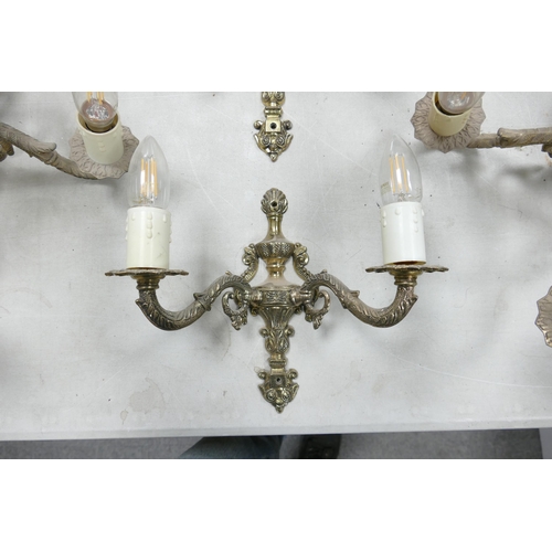 499G - A Pair of French style brass chandeliers together with two matching wall sconces. All with electric ... 