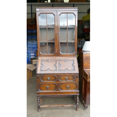 620 - Jacobean Revival Bureau Bookcase. Top with wood banded octagonal windows on barley twist legs and sh... 