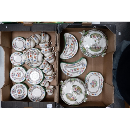 119 - A large collection of Spode Chinese Rose patterned items to include tureens, tea cups & saucers, hal... 