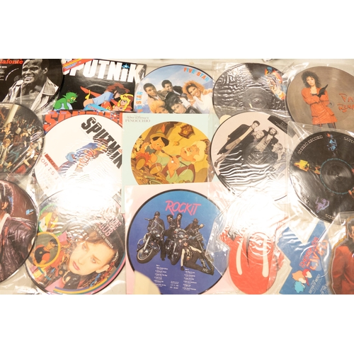 53 - A collection of 1980's & later picture disc records including Rolling Stones, The Killers , Sigsig s... 